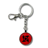 Llavero Metálico Mangekyo Sharingan Shisui Fondo Rojo