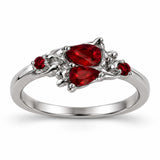 Anillo Entrelazado Piedras Rojas Plateado