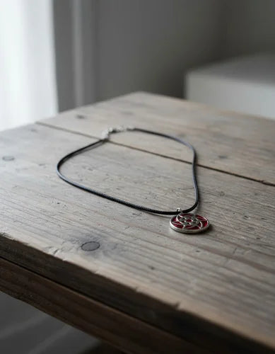Collar Mangekyo Sharingan de Sasuke Uchiha