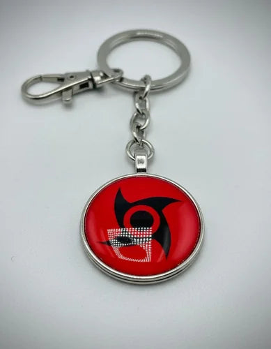Llavero Metálico Mangekyo Sharingan Shisui