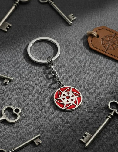 Llavero Metálico Mangekyo Sharingan de Sasuke Uchiha