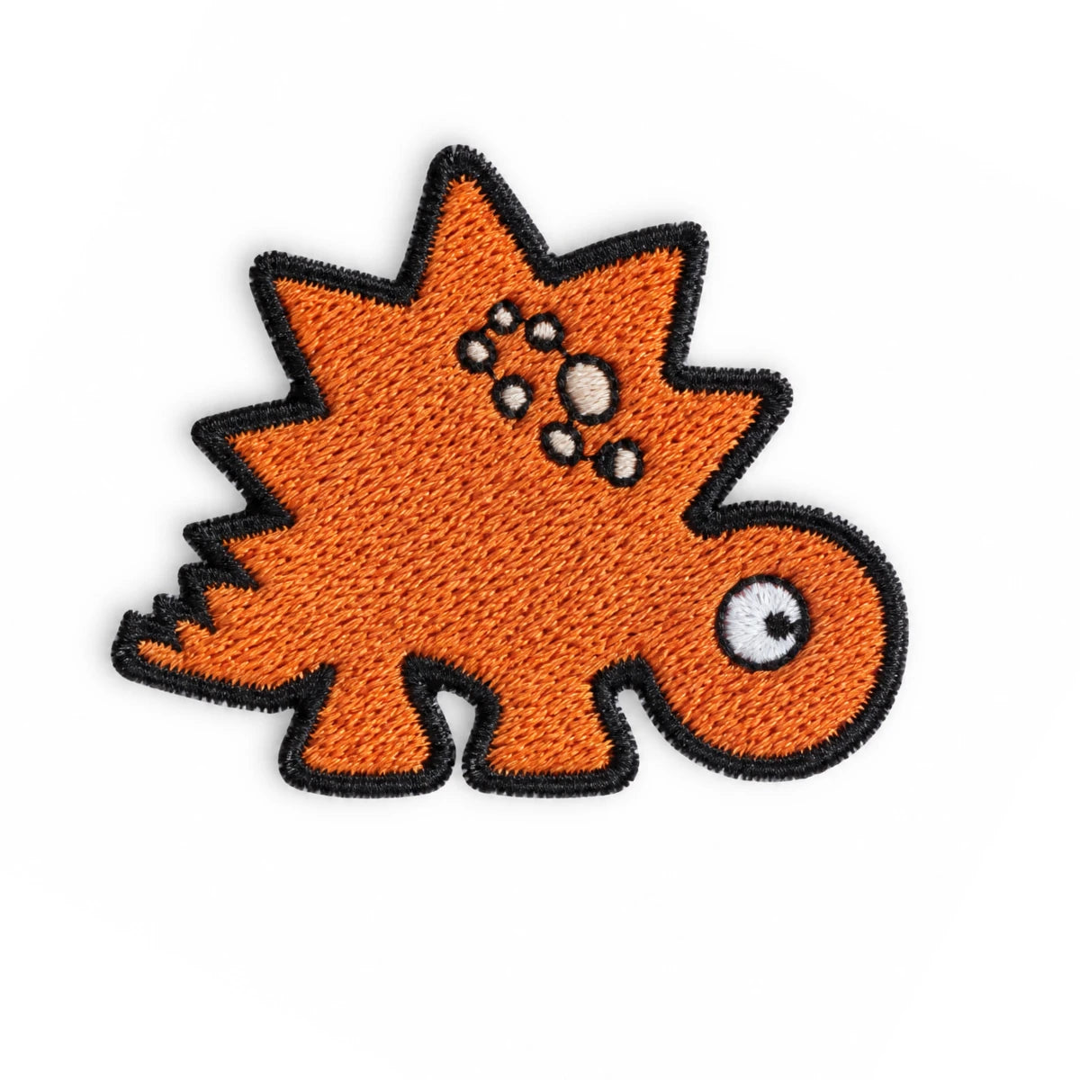 Parche Mediano Camiseta Dinosaurio Naranja Estegosaurio