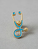 Pin Metálico Estetoscopio Azul Cielo Dorado